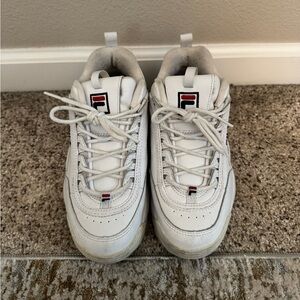 white FILA disruptor sneakers